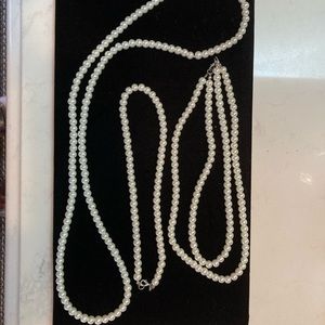 Choice of White faux pearls.
Dbl short or Long single strand. 9 1/2” or 18”